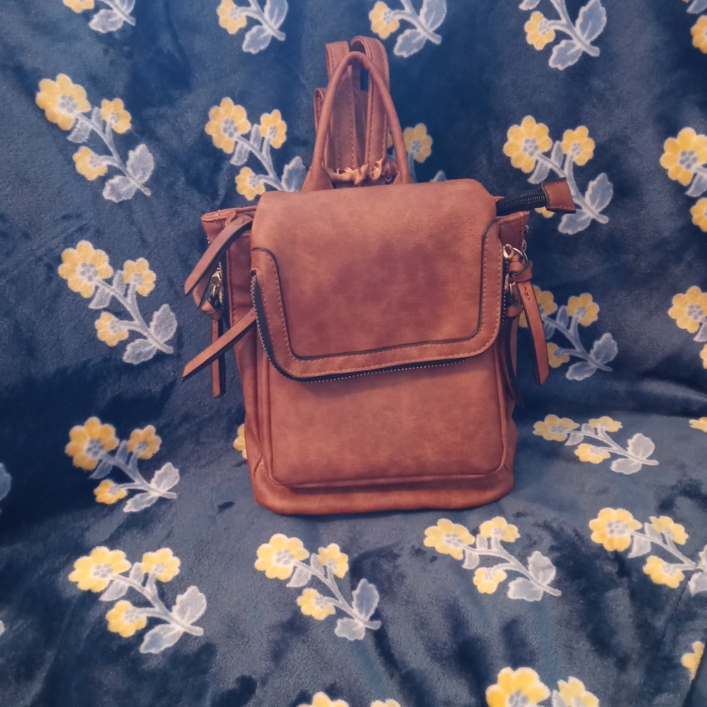brown leather backpack